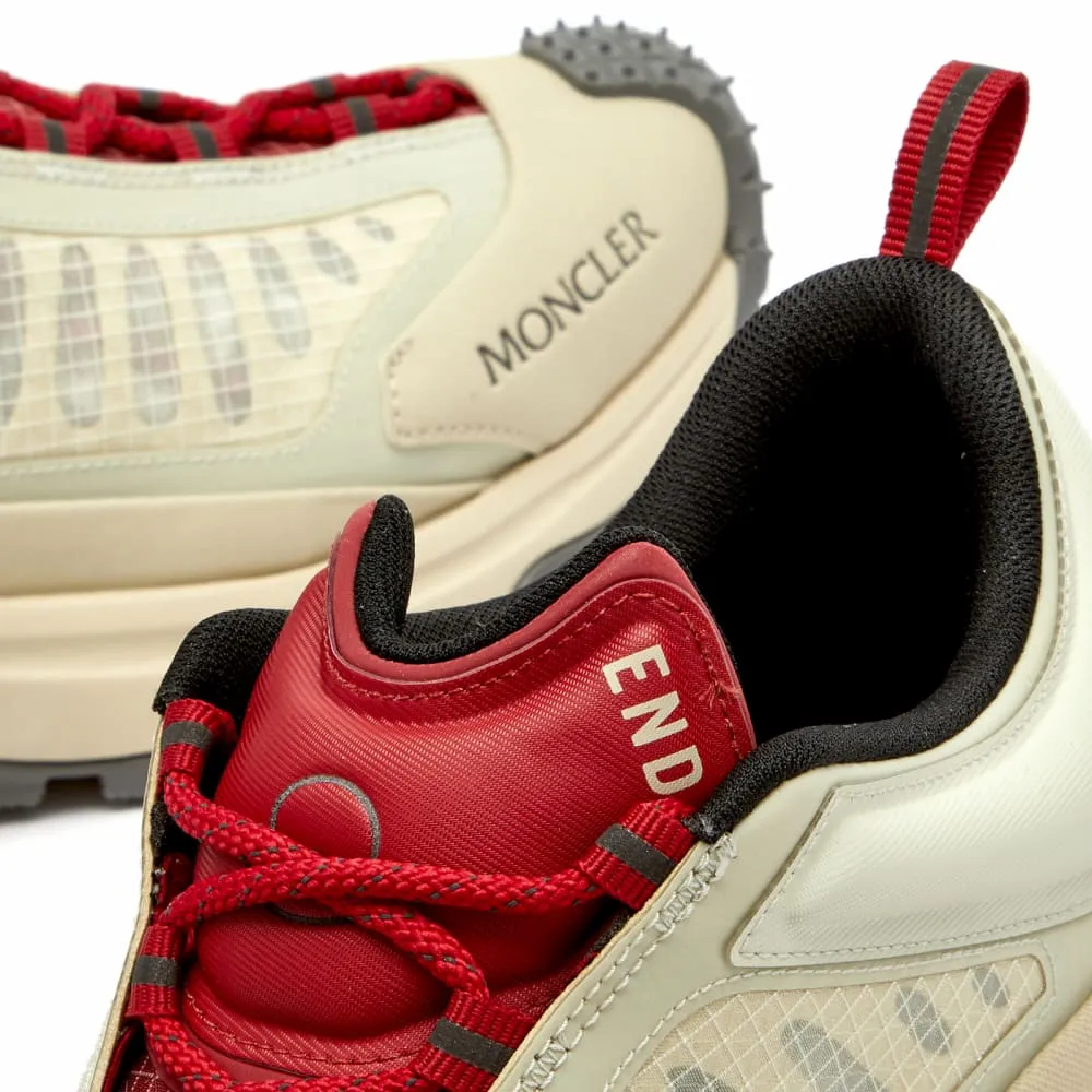 END. Lightweight Trailgrip sneakers in collaboration with Moncler, beige/red