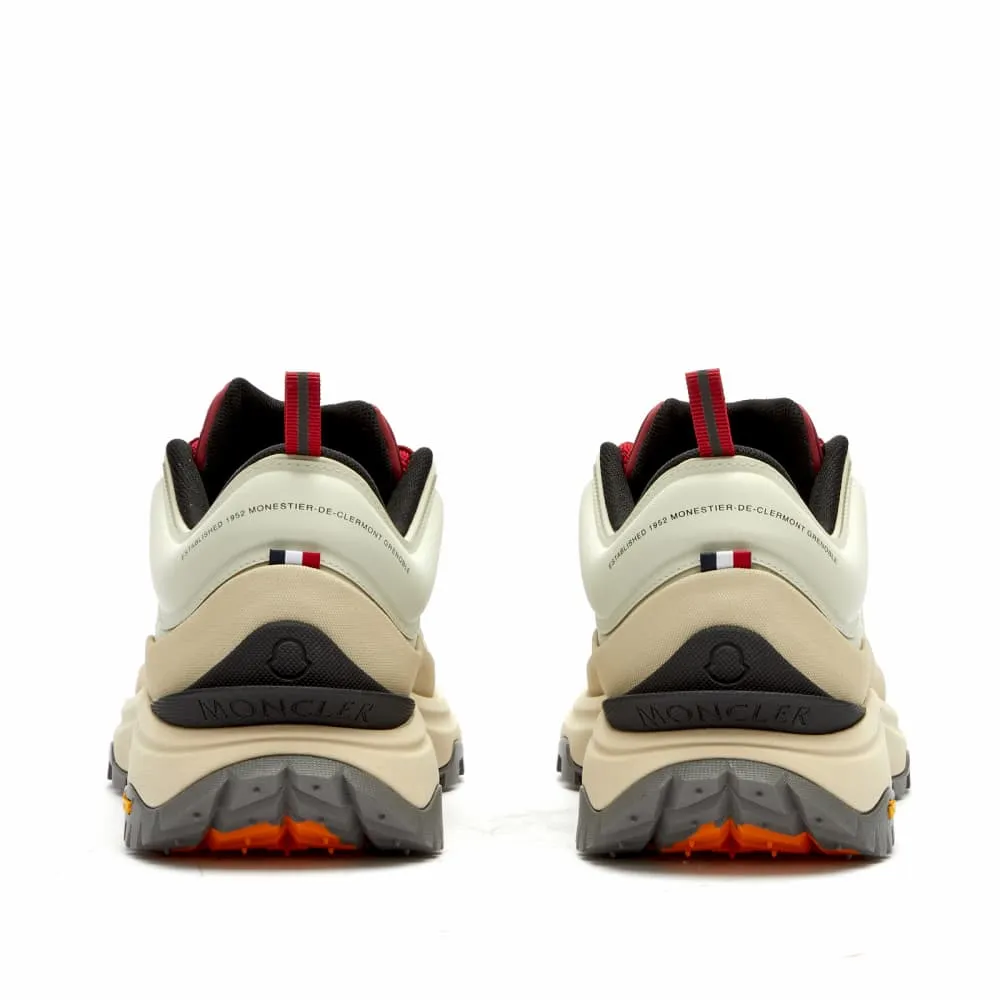 END. Lightweight Trailgrip sneakers in collaboration with Moncler, beige/red